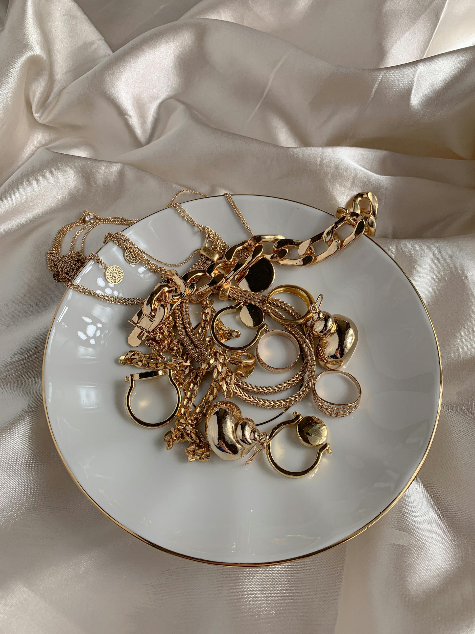 Golden Accessories on White Saucer